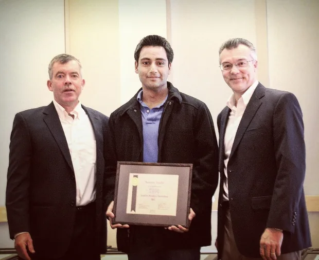 Sushain Pandit receiving a technical achievement award