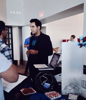 Sushain Pandit discussing emerging technology at an industry demonstration